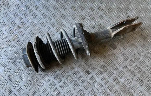 Front shock absorber with coil spring