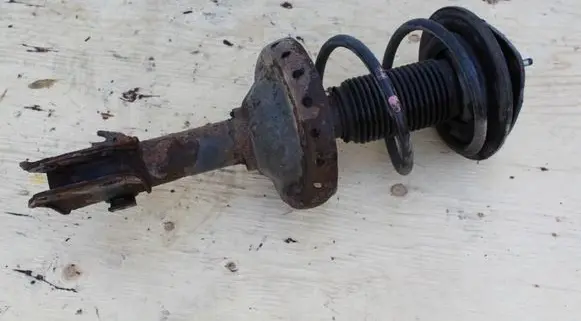 Subaru Legacy Front shock absorber with coil spring 20310AG440