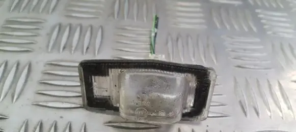 Mazda 323 F Number plate light