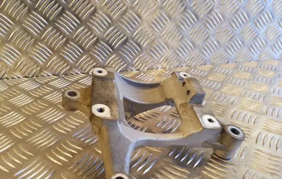 Subaru Outback (BS) A/C compressor mount bracket 27309
