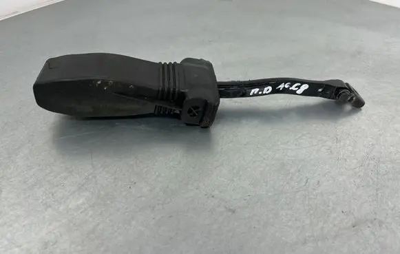 Front door check strap stopper