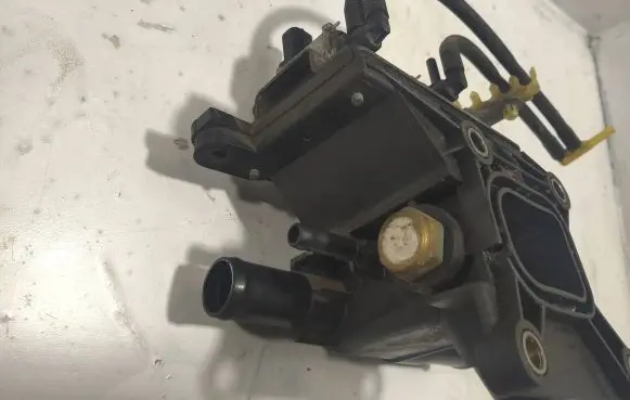 Thermostat/thermostat housing