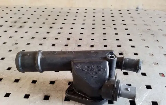 Thermostat/thermostat housing