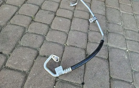 Fiat Doblo III Air conditioning (A/C) pipe/hose 9837885780