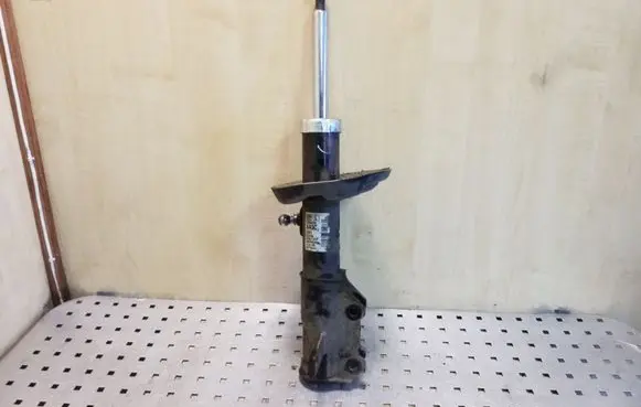 Opel Astra J Front shock absorber/damper 13354029 422267257
