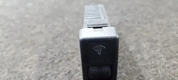 Panel lighting control switch