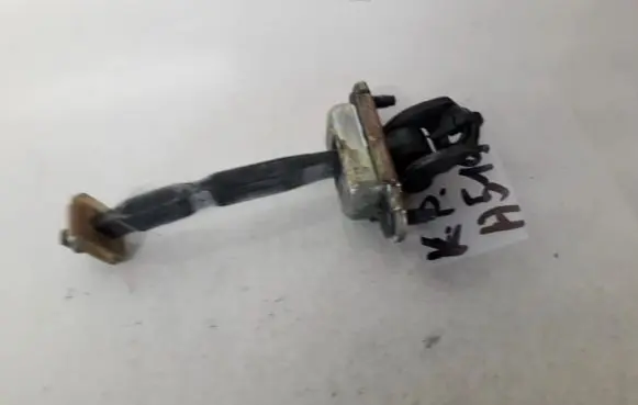 Nissan Almera N16 Front door check strap stopper 