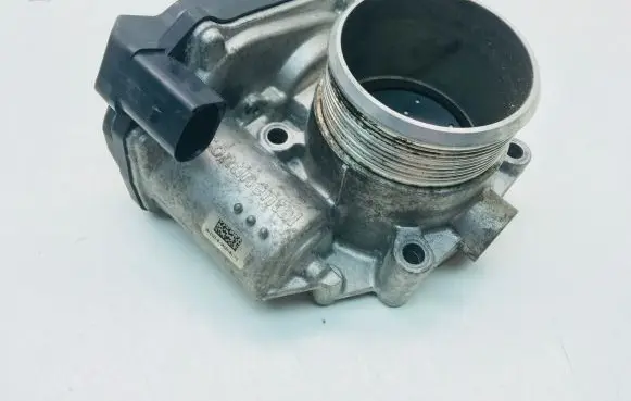 Volkswagen Golf V Throttle valve 06F133062Q A2C53390403