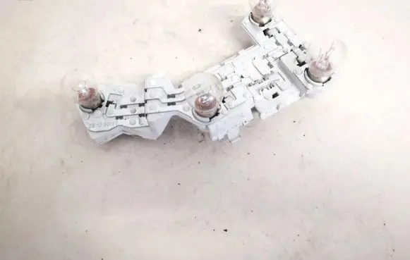 Volvo V50 Tail light bulb cover holder 28129007