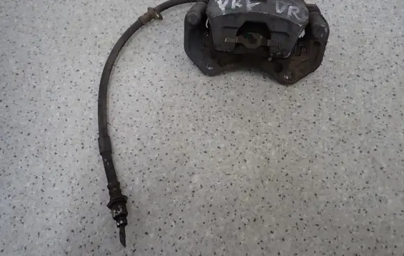 Daihatsu YRV Front brake caliper