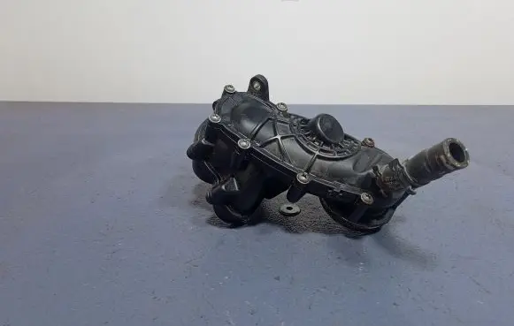 Thermostat/thermostat housing
