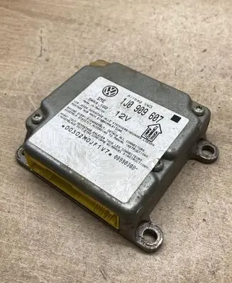 Volkswagen PASSAT B5 Airbag control unit/module 1J0909607 5WK4199