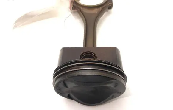 Piston with connecting rod
