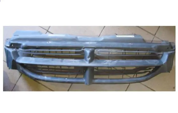Chrysler Voyager Front bumper upper radiator grill 04576955