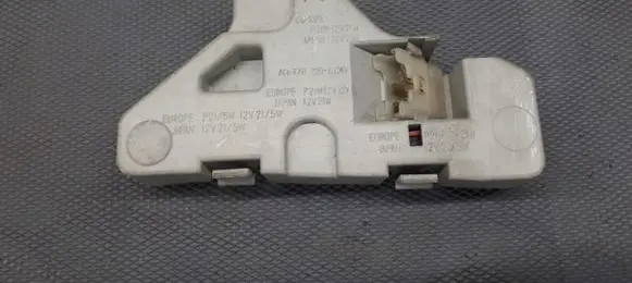 Mazda 121 SM Tail light bulb cover holder 22061364