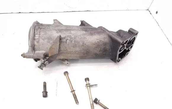 Mercedes-Benz E W124 Oil filter mounting bracket 6011840025 6011840602