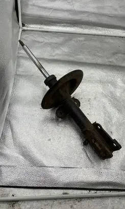 Chrysler Voyager Front shock absorber/damper 04743172AA H2352620