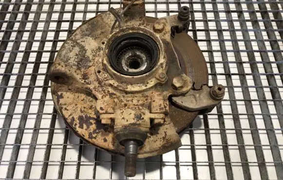 Front wheel hub spindle knuckle
