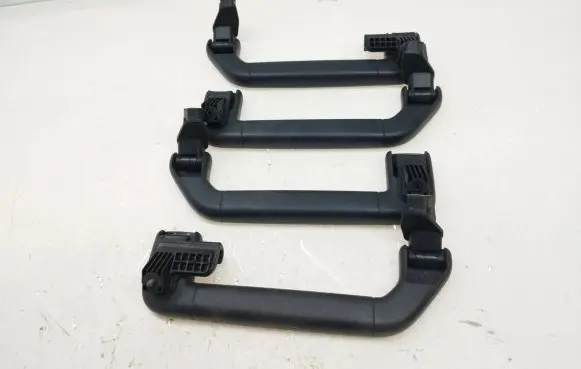 Volkswagen Touareg II A set of handles for the ceiling 7P0857643B 7P0857644B 3D5857608