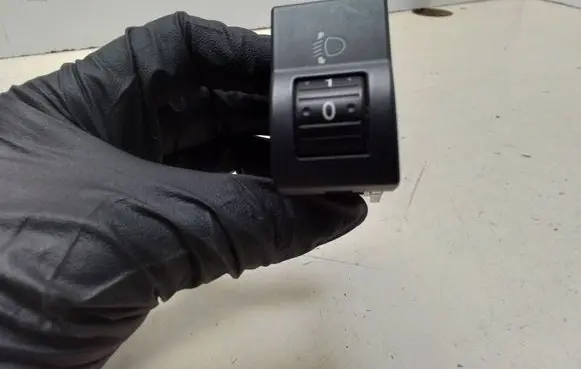 Headlight level height control switch
