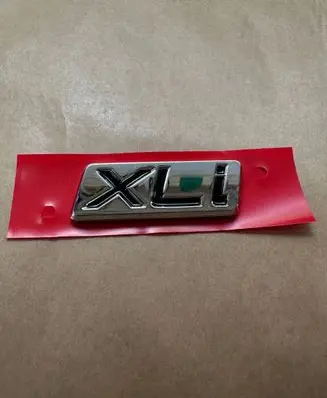 Toyota Corolla E210 E21 Manufacturers badge/model letters 7544402D60