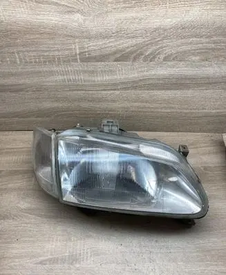 Renault Megane I Headlight/headlamp 7701672735 7700831463H