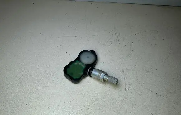 Nissan Juke I F15 Tire pressure sensor 407006WY0B 147012394B 00707FC