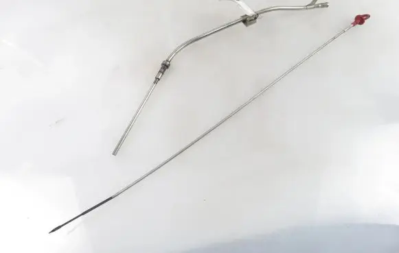 Oil level dip stick