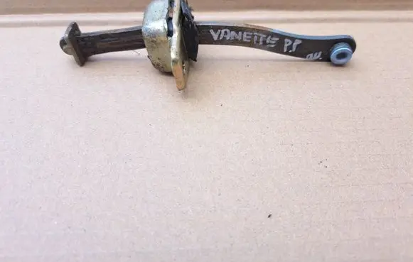 Nissan Vanette Front door check strap stopper 