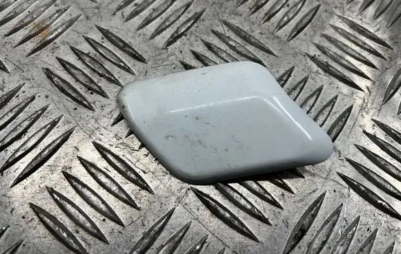 Headlight washer spray nozzle cap/cover