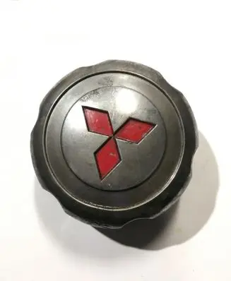 Mitsubishi L200 Original wheel cap MB816581