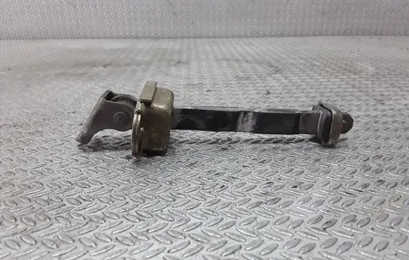 Nissan Primera Front door check strap stopper