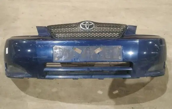 Toyota Corolla E120 E130 Front bumper melynas