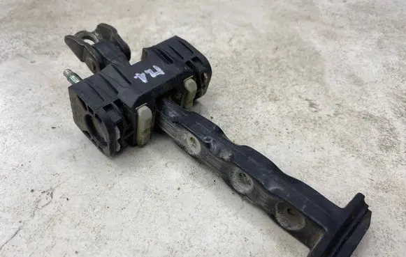 Volvo V70 Front door check strap stopper 