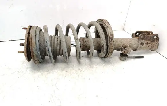 Chevrolet Tacuma Front shock absorber with coil spring