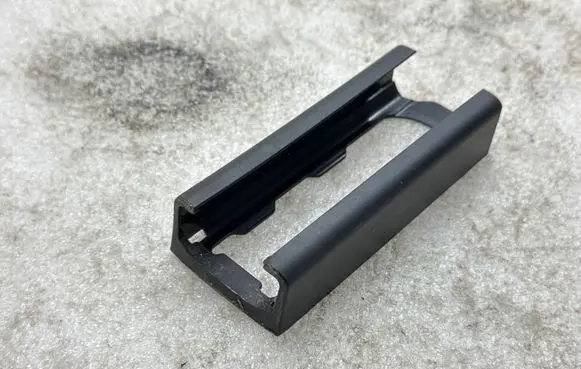 Tesla Model Y Front driver seat rail trim 156657300A