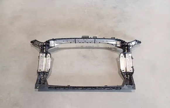 Radiator support slam panel