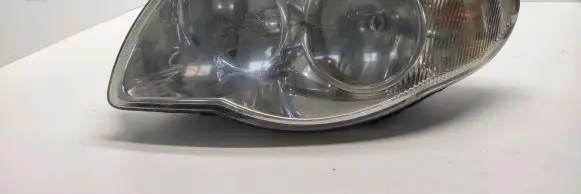 Chrysler Grand Voyager V Headlight/headlamp 04857831ac
