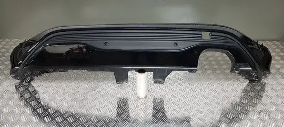 Rear bumper trim bar molding