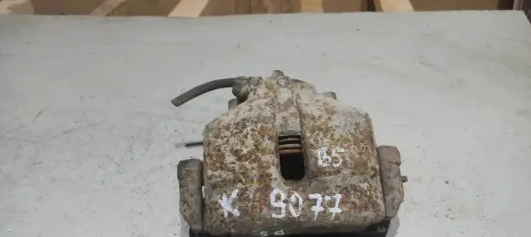 Volkswagen PASSAT B5 Front brake caliper