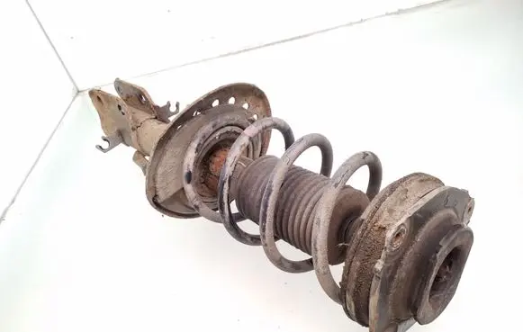 Nissan Pulsar Front shock absorber with coil spring