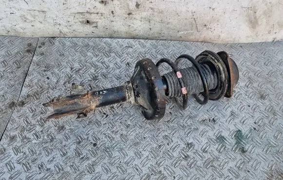 Subaru Impreza II Front shock absorber with coil spring 20312FE020