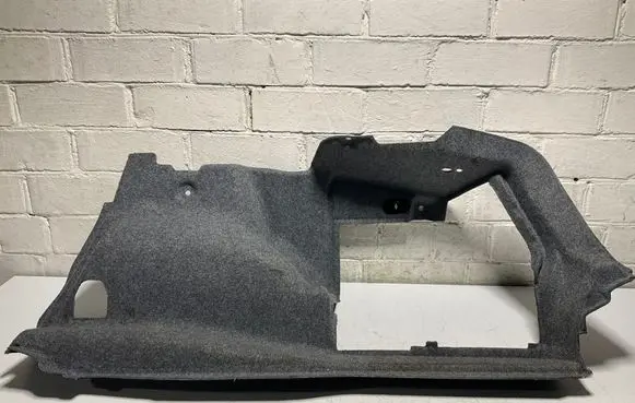 Trunk/boot lower side trim panel