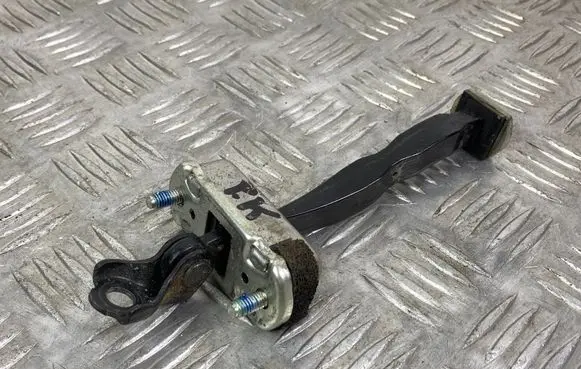 Front door check strap stopper
