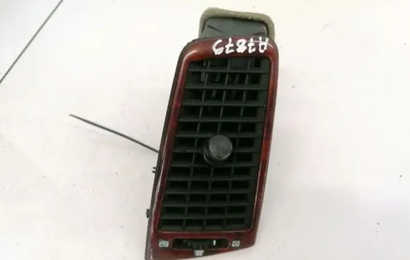 Cadillac CTS Dash center air vent grill 25703818 M1516D1410
