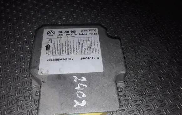 Volkswagen Touran I Airbag control unit/module 1T0909605