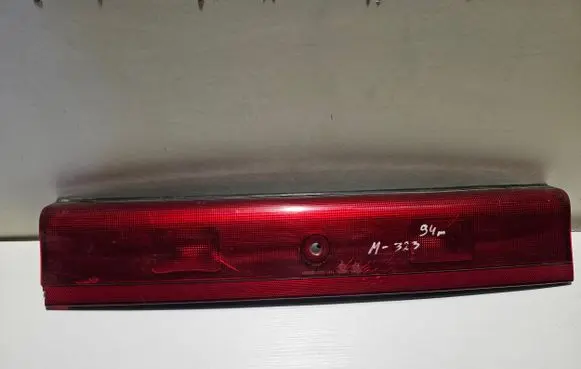 Mazda 323 Rear light center trim bar blend 0674664