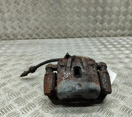 KIA Carens I Front brake caliper 0K2JA33990