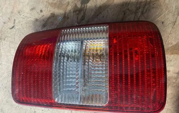 Volkswagen Caddy Rear/tail lights 2K0945112A