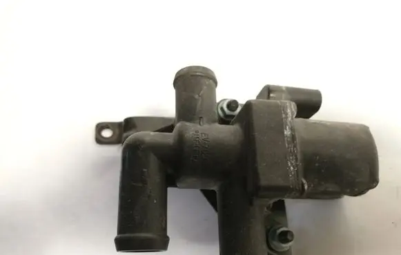 Coolant heater control valve
